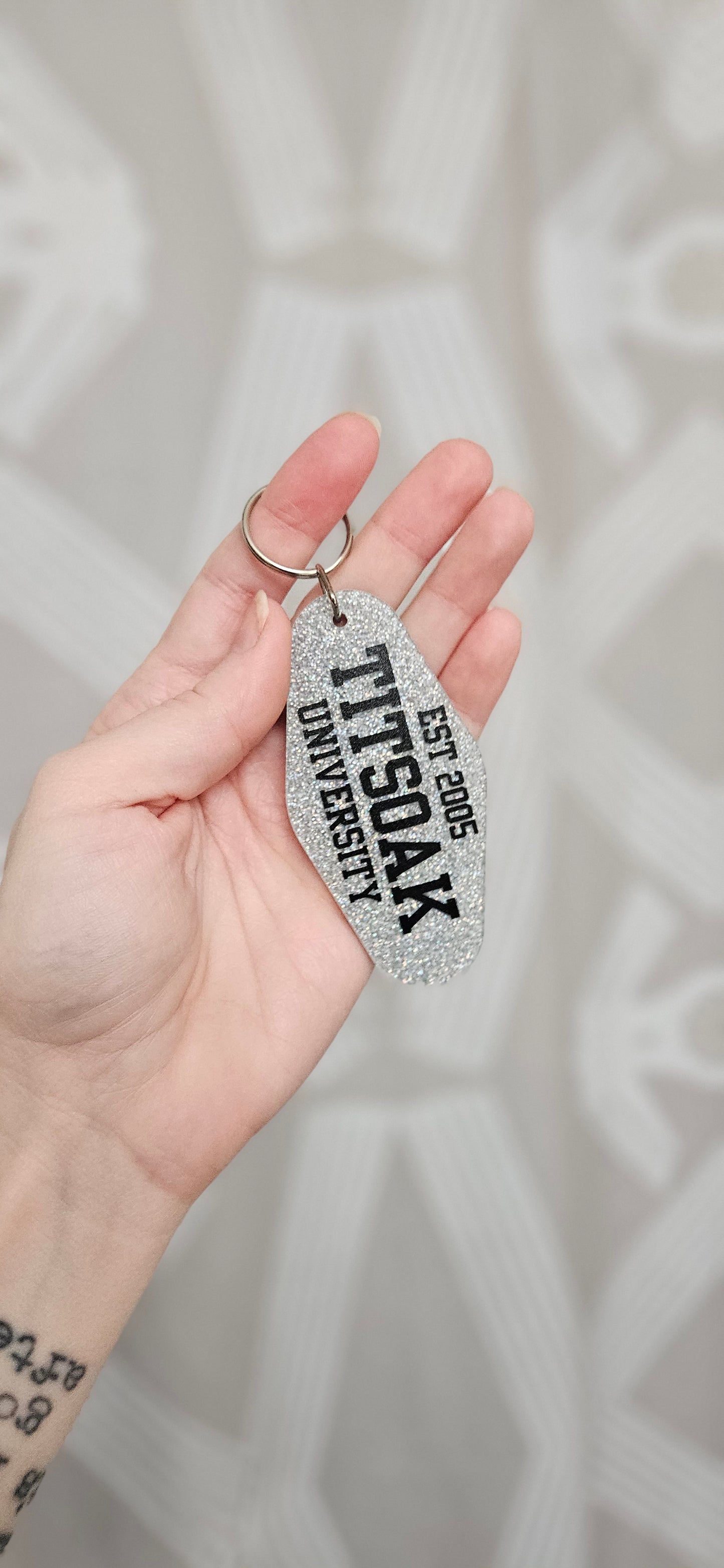 TITSOAK University Motel Keychain